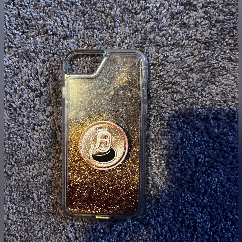 iPhone SE phone case with gold glitter in it